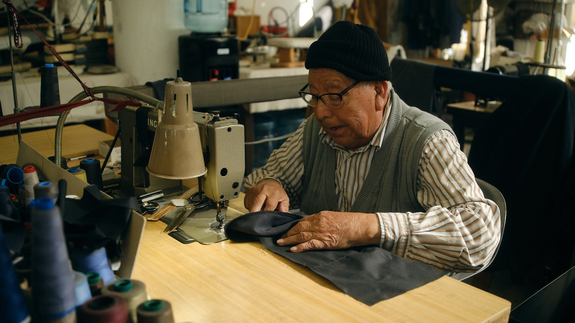 Daniel Custodio Cisneros at his sewing machine